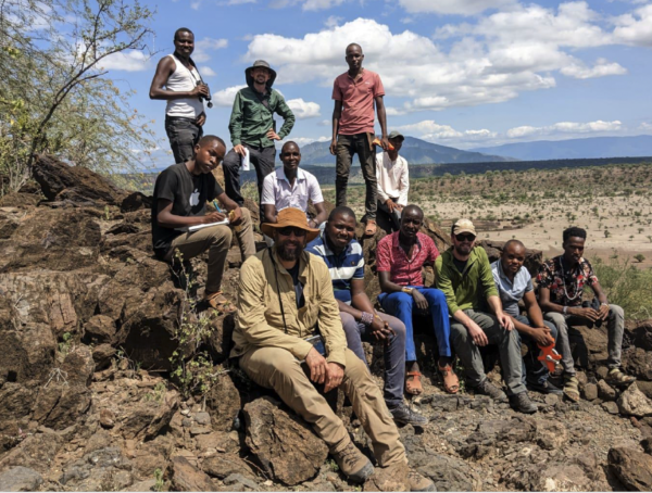 The biodiversity survey team takes a short break in the intense heat of Kenya’s Great Rift Valley. BRI scientists Chris Persico (front, left), Mark Burton (front, third from right), and Ed Jenkins (back, second from left) worked closely with Maasai wildlife experts including Denis Parmeres (middle, left) and Lankas Ole Noi (back, right) as well as local leaders and community members to conduct effective surveys in the area.