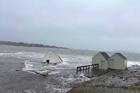 Historic fishing shacks in South Portland are destroyed by a severe storm.